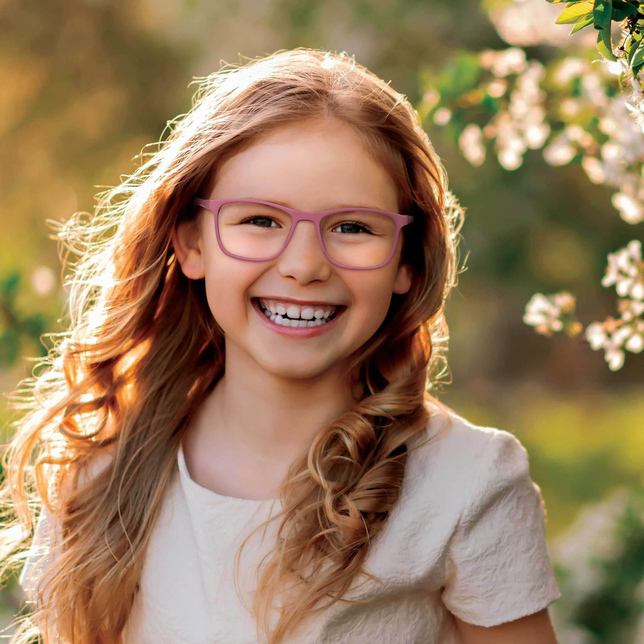 Girls wearing small fit ophthalmic frames for petite faces